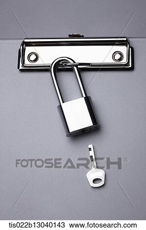 Drawing - a lock and a key. Fotosearch