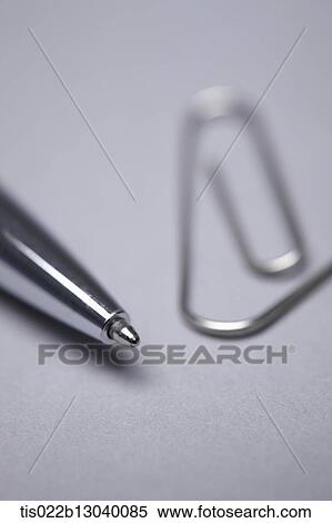 a paper clip and a pen View Large Illustration Stock Illustration - a paper clip and a pen. Fotosearch