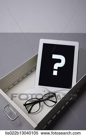a tablet and glasses in a drawer View Large Illustration Stock Illustration - a tablet and glasses in a drawer. Fotosearch