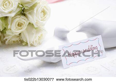 Stock Illustration - a wedding card and a bucket of white roses. Fotosearch