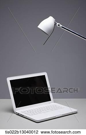 Drawing - a white laptop. Fotosearch