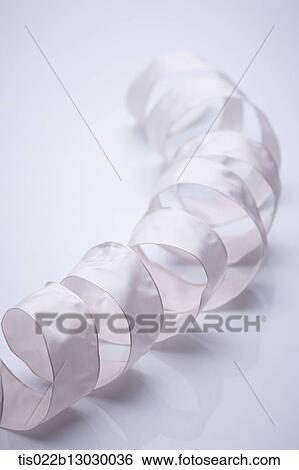 a white ribbon View Large Illustration Stock Illustration - a white ribbon. Fotosearch