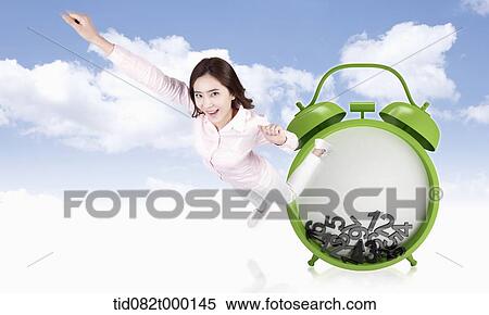 a woman flying away from a alarm clock View Large Illustration Stock Illustration - a woman flying away from a alarm clock. Fotosearch