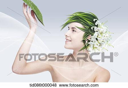 Stock Illustration - a woman with flowers as her hair. Fotosearch