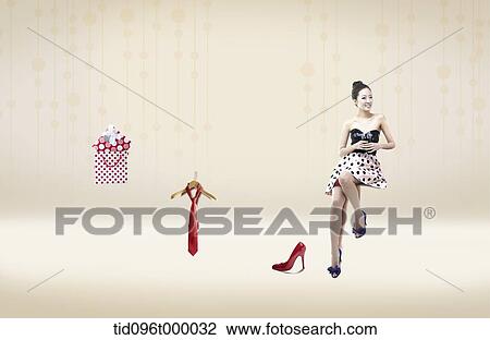 Drawing - a woman with shopping items. Fotosearch