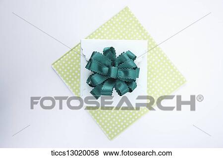 gift box with green ribbon View Large Illustration Stock Illustration - gift box with green ribbon. Fotosearch
