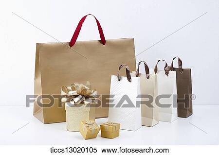 Stock Illustration - gift boxes and gift bags. Fotosearch