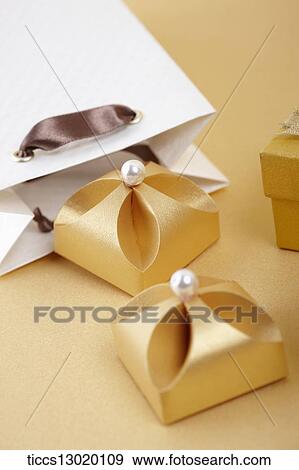 Stock Illustration - gift boxes from a shopping bag. Fotosearch