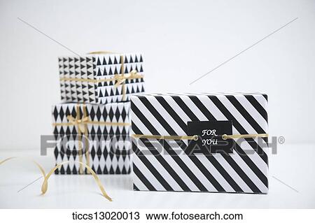 Drawing - gift boxes in black colour. Fotosearch