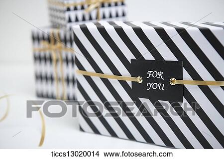gift boxes in black colour View Large Illustration Stock Illustration - gift boxes in black colour. Fotosearch