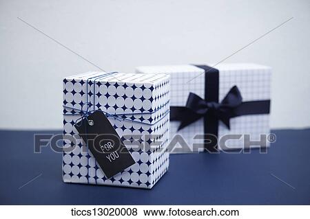 Stock Illustration - gift boxes in blue colour. Fotosearch