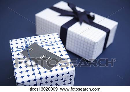 Stock Illustration - gift boxes in blue colour. Fotosearch