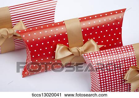 gift boxes in red colours View Large Illustration Clip Art - gift boxes in red colours . Fotosearch