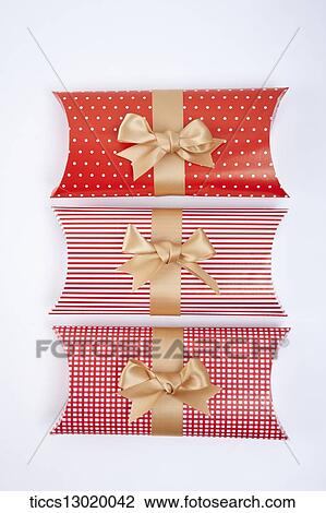 Drawing - gift boxes in red colours . Fotosearch