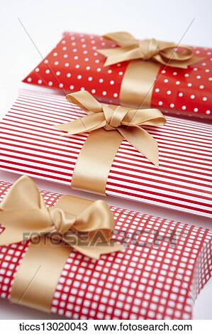 Drawing - gift boxes in red colours . Fotosearch