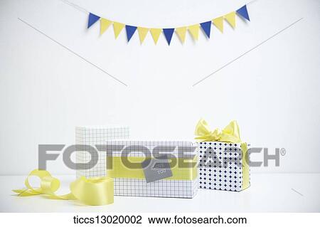 Drawing - gift boxes in yellow colour. Fotosearch