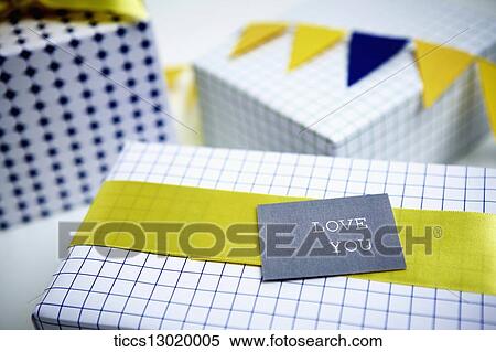 Stock Illustration - gift boxes in yellow colour. Fotosearch