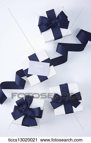 Clip Art - gift boxes with blue ribbons . Fotosearch
