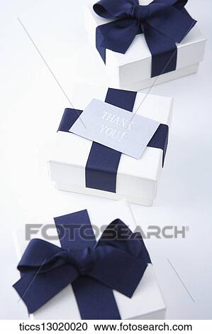 Clipart - gift boxes with blue ribbons . Fotosearch