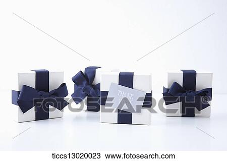 Drawing - gift boxes with blue ribbons . Fotosearch