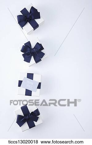 Stock Illustration - gift boxes with blue ribbons . Fotosearch