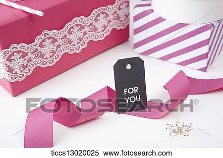 Stock Illustration - gift boxes with pink ribbons. Fotosearch
