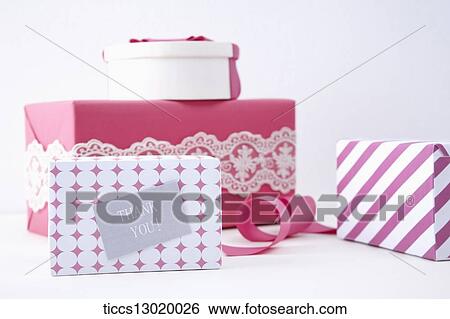 Stock Illustration - gift boxes with pink ribbons. Fotosearch