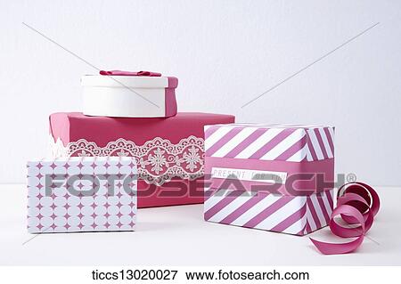 Stock Illustration - gift boxes with pink ribbons. Fotosearch