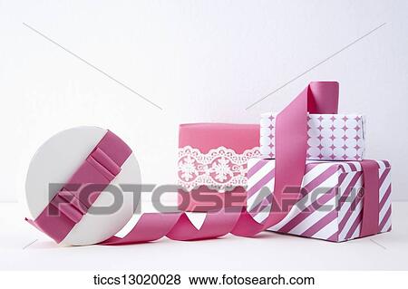 Stock Illustration - gift boxes with pink ribbons. Fotosearch
