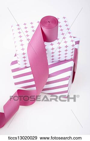 gift boxes with pink ribbons View Large Illustration Stock Illustration - gift boxes with pink ribbons. Fotosearch
