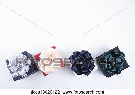 Drawing - gift boxes with ribbons . Fotosearch
