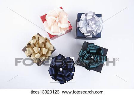 Drawing - gift boxes with ribbons . Fotosearch