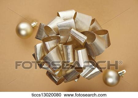 Clipart - golden ribbon with pearls. Fotosearch