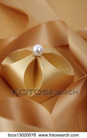 graceful orange gift box with pearl View Large Illustration Stock Illustration - graceful orange gift box with pearl. Fotosearch