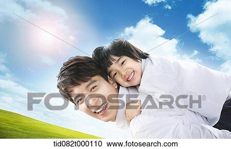 Clipart - green image featuring father and son. Fotosearch