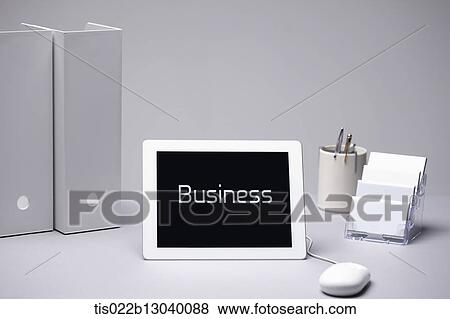 paper folders and a tablet View Large Illustration Stock Illustration - paper folders and a tablet. Fotosearch