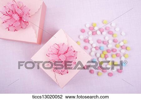Drawing - pink gift boxes with pink flowers. Fotosearch