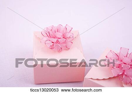 Drawing - pink gift boxes with pink flowers. Fotosearch
