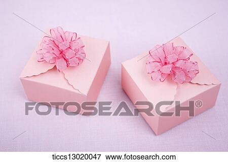 Stock Illustration - pink gift boxes with pink flowers. Fotosearch