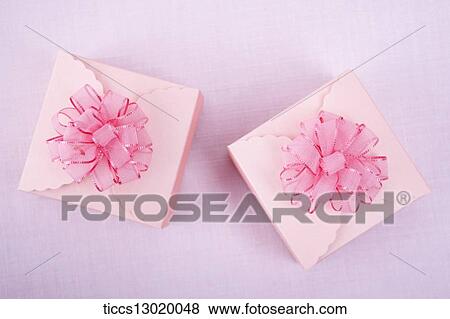 Stock Illustration - pink gift boxes with pink flowers. Fotosearch