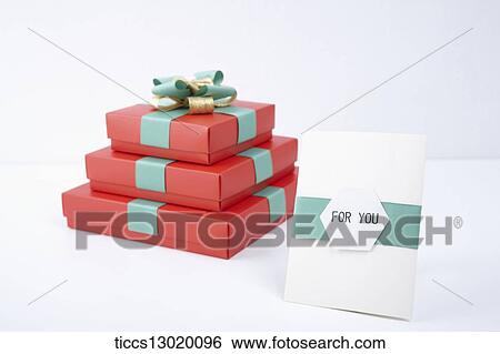 Stock Illustration - red gift boxes with nice ribbons in a pile. Fotosearch