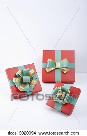 Stock Illustration - red gift boxes with nice ribbons. Fotosearch