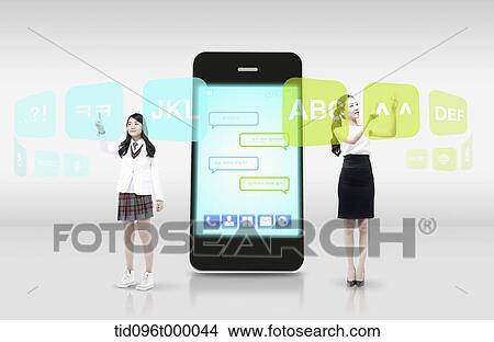 Stock Illustration - two girls clicking on icons next to a mobile phone. Fotosearch