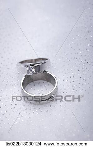Stock Illustration - two wedding rings. Fotosearch