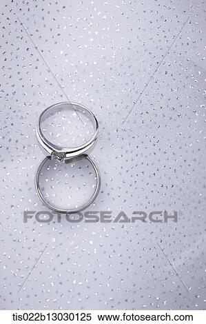 Stock Illustration - two wedding rings. Fotosearch