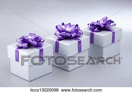 white gift boxes with purple ribbons View Large Illustration Stock Illustration - white gift boxes with purple ribbons. Fotosearch
