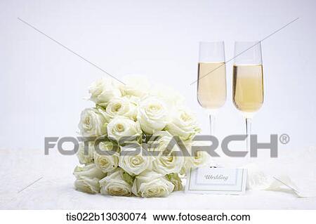 Stock Illustration - white roses and two glasses of champagne. Fotosearch