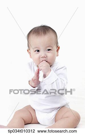 a baby brushing teeth View Large Photo Image Stock Image - a baby brushing teeth. Fotosearch