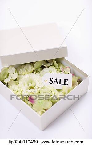 a box of flowers with a memo saying sale View Large Photo Image Stock Photo - a box of flowers with a memo saying sale. Fotosearch