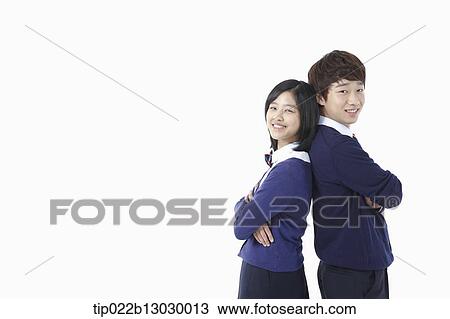 Stock Image - a boy and a girl in school uniforms. Fotosearch